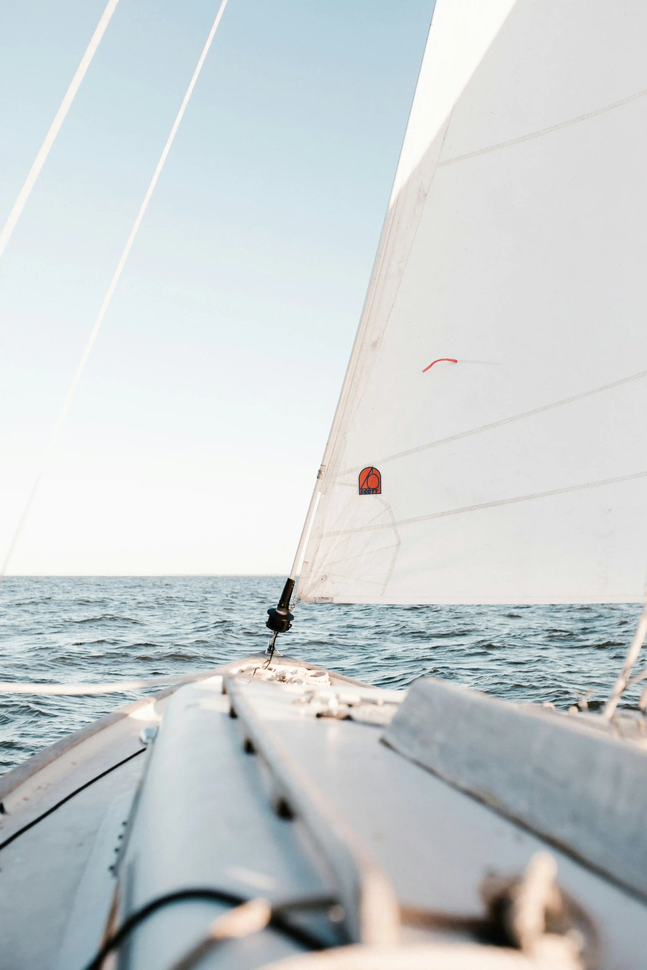 white-sail-on-yacht-in-the-ocean white-sail-on-yacht-in-the-ocean
