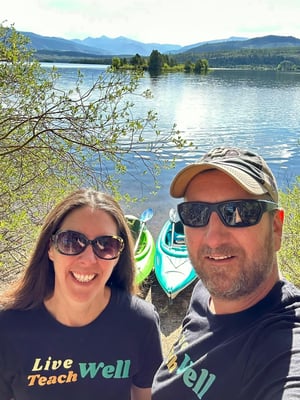 Sybil and Brian in front of their investment property on Lake Dillion, Colorado