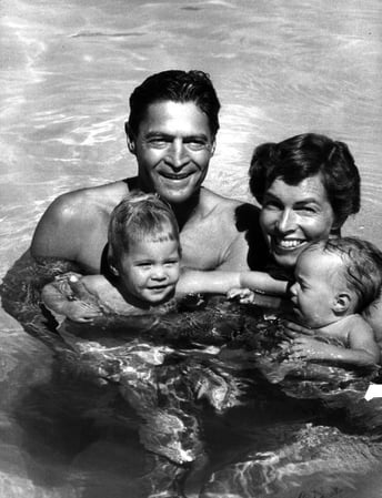Caption from LIFE. Joel Brecheen enjoys the pool he built in Phoenix, Ariz. with his wife and their two children Alfred Eisenstaedt—The LIFE Picture Collection/Getty Images