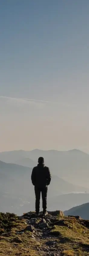 Man on mountain swtichback